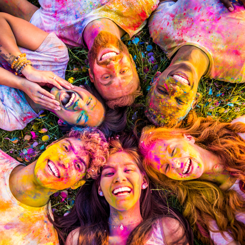 Group of diverse individuals engaging in a community event, symbolizing the power of shared spaces and collaboration in the revolution of consciousness.